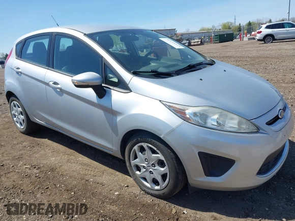2013 Ford Fiesta SE with VIN 3FADP4EJ9DM157685, listed as a IAAI auction lot 42145511 with 101,331 mi miles. Bid and sale history available at carsss.com. Image 1.