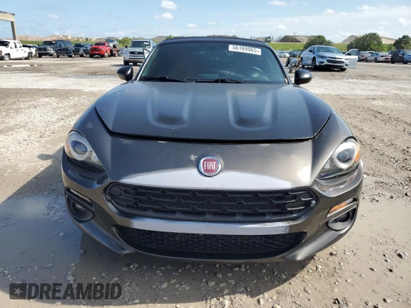 2017 FIAT 124 Spider Lusso z VIN JC1NFAEK7H0123436, wystawiony jako Copart lot #56169965 z przebiegiem 133 320 mil mil oraz Czysty tytuł • Clean title. Historia ofert i sprzedaży dostępna na DreamBid. Obrazek 5.