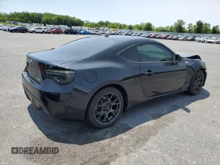 2014 Scion FR-S z VIN JF1ZNAA16E8702957, wystawiony jako Copart lot #58801915 z przebiegiem 114 656 mil mil oraz Szkoda całkowita • Salvage title. Historia ofert i sprzedaży dostępna na DreamBid. Obrazek 3.