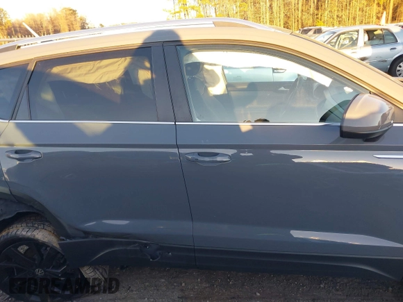 2024 Volkswagen Taos SE z VIN 3VVEX7B22RM112576, wystawiony jako IAAI lot #41606673 z przebiegiem 141 mil mil oraz . Historia ofert i sprzedaży dostępna na DreamBid. Obrazek 13.