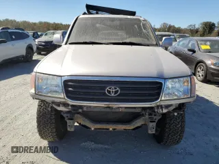 2002 Toyota Land Cruiser with VIN JTEHT05J122027769, listed as a Copart auction lot 76518004 with 151,767 mi miles and Salvage Title. Bid and sale history available at carsss.com. Image 5.