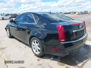 2008 Cadillac CTS RWD z VIN 1G6DJ577080174096, wystawiony jako IAAI lot #42237070 z przebiegiem 139 776 mil mil oraz . Historia ofert i sprzedaży dostępna na DreamBid. Obrazek 3.