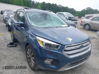 2018 Ford Escape Titanium with VIN 1FMCU0J99JUA12717, listed as a IAAI auction lot 42237509 with 123,896 mi miles and . Bid and sale history available at DreamBid. Image 1.