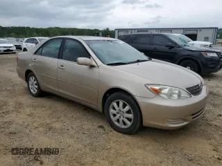 2004 Toyota Camry LE with VIN 4T1BF32K94U584660, listed as a Copart auction lot 54546085 with 275,229 mi miles and Clean Title. Bid and sale history available at carsss.com. Image 4.