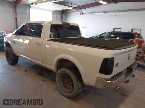 2015 Ram 1500 Laramie Limited with VIN 1C6RR7WM6FS678840, listed as a IAAI auction lot 42040449 with Not provided miles and . Bid and sale history available at DreamBid. Image 3.