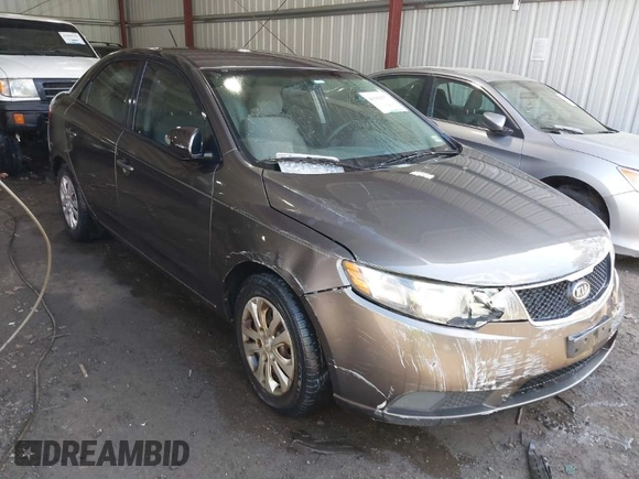 2010 Kia Forte EX with VIN KNAFU4A26A5882153, listed as a IAAI auction lot 41904559 with 162,554 mi miles. Bid and sale history available at carsss.com. Image 1.