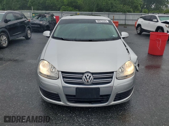 2010 Volkswagen Jetta TDI with VIN 3VWRL7AJXAM028463, listed as a Copart auction lot 60912445 with 242,906 mi miles and Salvage title. Bid and sale history available at DreamBid. Image 5.