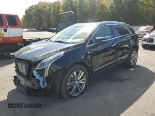 2023 Cadillac XT5 AWD Premium Luxury with VIN 1GYKNDRS3PZ180600, listed as a Copart auction lot 75298904 with 16,936 mi miles and Salvage Title. Bid and sale history available at DreamBid. Image 1.