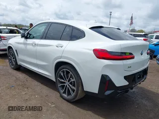 2023 BMW X4 M40i with VIN 5UX43DT03P9P97845, listed as a IAAI auction lot 42098144 with 20,807 mi miles and . Bid and sale history available at DreamBid. Image 3.