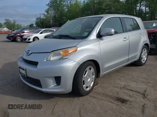 2008 Scion xD with VIN JTKKU104X8J023306, listed as a IAAI auction lot 42120680 with 200,746 mi miles. Bid and sale history available at carsss.com. Image 2.
