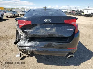 2013 Kia Optima EX z VIN 5XXGN4A72DG108840, wystawiony jako Copart lot #58207355 z przebiegiem 114 629 mil mil oraz Szkoda całkowita • Salvage title. Historia ofert i sprzedaży dostępna na DreamBid. Obrazek 6.