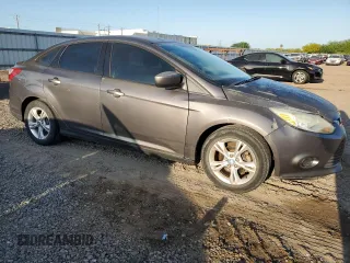 2013 Ford Focus SE z VIN 1FADP3F22DL233878, wystawiony jako Copart lot #52598475 z przebiegiem 131 539 mil mil oraz Szkoda całkowita • Salvage title. Historia ofert i sprzedaży dostępna na DreamBid. Obrazek 4.