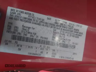 2012 Ford Focus SE z VIN 1FAHP3F2XCL454967, wystawiony jako IAAI lot #42467432 z przebiegiem Nie podano mil oraz . Historia ofert i sprzedaży dostępna na DreamBid. Obrazek 9.