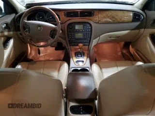 2006 Jaguar S-Type 3 z VIN SAJWA01A96FN53736, wystawiony jako Copart lot #52300005 z przebiegiem 68 472 mil mil oraz Szkody całkowita. Historia ofert i sprzedaży dostępna na DreamBid. Obrazek 8.