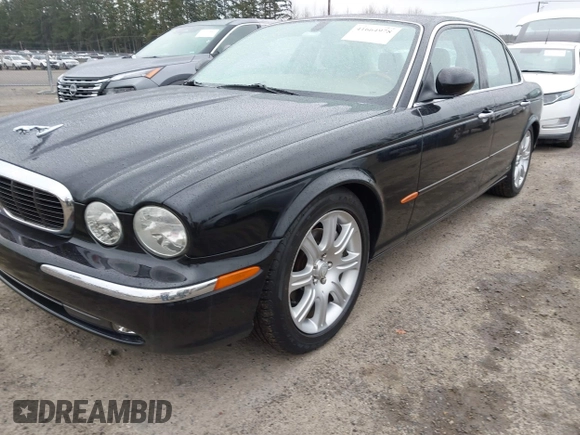 2004 Jaguar XJ with VIN SAJWA71C94SG29019, listed as a IAAI auction lot 41664978 with 133,546 mi miles. Bid and sale history available at carsss.com. Image 2.