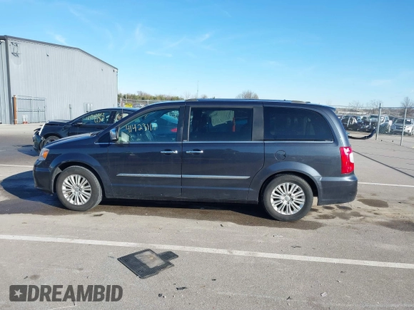 2014 Chrysler Town & Country Limited with VIN 2C4RC1GGXER176316, listed as a IAAI auction lot 41423119 with 150,109 mi miles and . Bid and sale history available at DreamBid. Image 14.