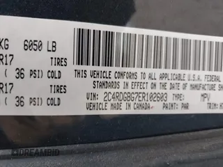 2014 Dodge Grand Caravan American Value with VIN 2C4RDGBG7ER102603, listed as a IAAI auction lot 41278072 with Not Provided miles and . Bid and sale history available at DreamBid. Image 9.