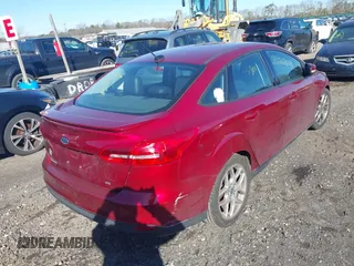 2015 Ford Focus SE with VIN 1FADP3F27FL381463, listed as a IAAI auction lot 41778792 with 999,999 mi miles. Bid and sale history available at carsss.com. Image 4.