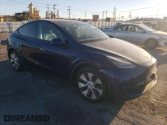 2021 Tesla Model Y Long Range with VIN 5YJYGDEE8MF148849, listed as a Copart auction lot 80894154 with 61,022 mi miles and Salvage Title. Bid and sale history available at carsss.com. Image 4.