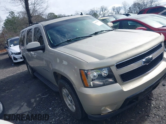 2007 Chevrolet Suburban LS with VIN 1GNFC16047J252702, listed as a IAAI auction lot 41576927 with 401,122 mi miles and . Bid and sale history available at DreamBid. Image 1.