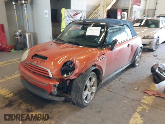 2005 MINI Convertible S with VIN WMWRH33455TK55035, listed as a IAAI auction lot 41936645 with 111,018 mi miles and . Bid and sale history available at DreamBid. Image 2.