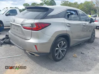 2019 Lexus RX with VIN 2T2ZZMCA1KC131631, listed as a IAAI auction lot 41692742 with 90,161 mi miles. Bid and sale history available at carsss.com. Image 4.