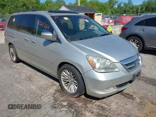 2006 Honda Odyssey Touring z VIN 5FNRL38826B001980, wystawiony jako IAAI lot #42247064 z przebiegiem 211 877 mil mil oraz . Historia ofert i sprzedaży dostępna na DreamBid. Obrazek 1.