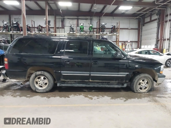 2002 Chevrolet Suburban Z71 with VIN 3GNFK16Z42G305930, listed as a IAAI auction lot 41002347 with 288,355 mi miles. Bid and sale history available at carsss.com. Image 13.