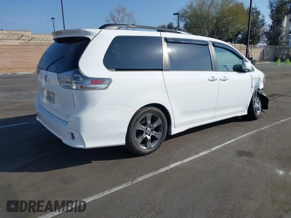 2015 Toyota Sienna SE with VIN 5TDXK3DC6FS627578, listed as a IAAI auction lot 41568684 with 124,138 mi miles and . Bid and sale history available at DreamBid. Image 4.