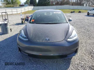2019 Tesla Model 3 Mid Range with VIN 5YJ3E1EA5KF412702, listed as a Copart auction lot 50008895 with 134,178 mi miles and Salvage Title. Bid and sale history available at carsss.com. Image 5.