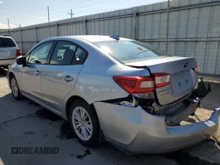 2017 Subaru Impreza Premium with VIN 4S3GKAD64H3607316, listed as a Copart auction lot 59721515 with 96,582 mi miles and Salvage title. Bid and sale history available at DreamBid. Image 2.