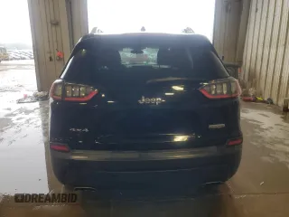 2019 Jeep Cherokee Altitude with VIN 1C4PJMLX5KD386597, listed as a Copart auction lot 59132655 with 129,243 mi miles and Salvage title. Bid and sale history available at DreamBid. Image 6.