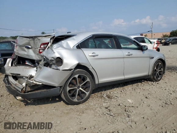 2014 Ford Taurus SEL with VIN 1FAHP2E8XEG184523, listed as a Copart auction lot 67643764 with 157,851 mi miles and Salvage Title. Bid and sale history available at carsss.com. Image 3.