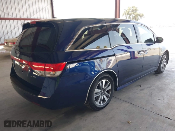 2017 Honda Odyssey Touring with VIN 5FNRL5H90HB017215, listed as a IAAI auction lot 42574528 with 61,386 mi miles and . Bid and sale history available at DreamBid. Image 4.