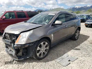 2012 Cadillac SRX Performance Collection z VIN 3GYFNEE34CS589833, wystawiony jako Copart lot #56138324 z przebiegiem Nie podano mil oraz Szkoda całkowita • Salvage title. Historia ofert i sprzedaży dostępna na DreamBid. Obrazek 1.