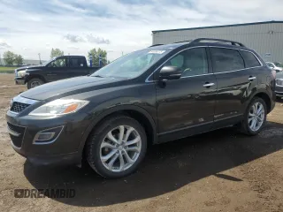 2012 Mazda CX-9 Grand Touring с VIN JM3TB3DA0C0351725, выставлен на аукционе Copart как лот 64089375 с пробегом 230 811 миль миль и Списание • Salvage title. История ставок и продаж доступна на DreamBid. Изображение 1.