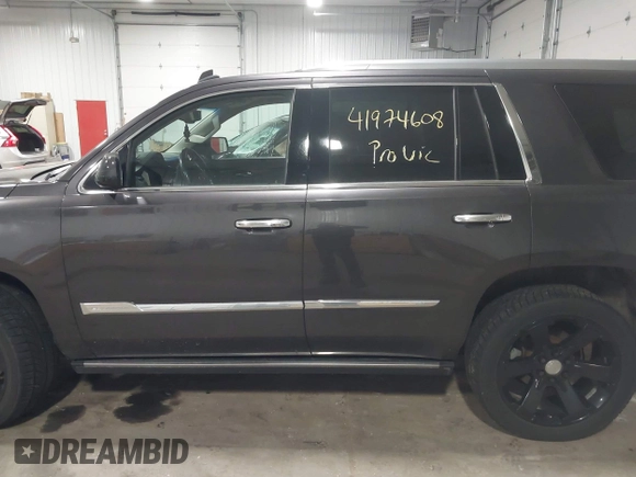 2015 Cadillac Escalade Premium with VIN 1GYS4CKJ8FR308617, listed as a IAAI auction lot 41974608 with 154,014 mi miles and . Bid and sale history available at DreamBid. Image 14.