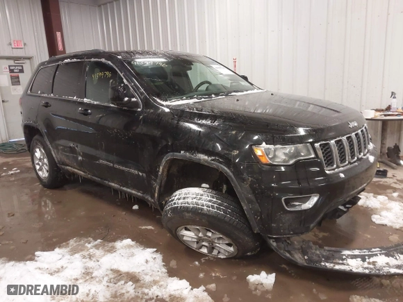 2018 Jeep Grand Cherokee Laredo E with VIN 1C4RJFAG3JC334865, listed as a IAAI auction lot 41599796 with 127,591 mi miles. Bid and sale history available at carsss.com. Image 1.