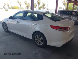 2016 Kia Optima LX with VIN KNAGT4L34G5105864, listed as a IAAI auction lot 42161194 with 106,351 mi miles. Bid and sale history available at carsss.com. Image 3.
