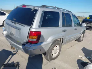 2004 Jeep Grand Cherokee Laredo with VIN 1J4GX48NX4C403936, listed as a IAAI auction lot 40855256 with 241,290 mi miles. Bid and sale history available at carsss.com. Image 4.