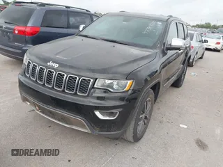 2018 Jeep Grand Cherokee Limited with VIN 1C4RJEBG7JC246667, listed as a IAAI auction lot 42342135 with 116,954 mi miles and . Bid and sale history available at DreamBid. Image 2.