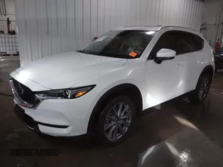 2021 Mazda CX-5 Grand Touring with VIN JM3KFADM3M0312143, listed as a IAAI auction lot 41606582 with 46,515 mi miles. Bid and sale history available at carsss.com. Image 17.