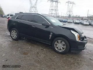 2010 Cadillac SRX Luxury Collection with VIN 3GYFNAEY4AS649868, listed as a IAAI auction lot 41935574 with 183,826 mi miles. Bid and sale history available at carsss.com. Image 1.