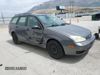 2006 Ford Focus SE with VIN 1FAHP36N56W223049, listed as a Copart auction lot 61211745 with 185,609 mi miles and Salvage title. Bid and sale history available at DreamBid. Image 4.