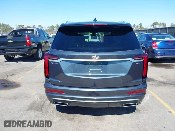 2021 Cadillac XT6 Premium Luxury with VIN 1GYKPERS0MZ110029, listed as a IAAI auction lot 41669104 with 58,890 mi miles and . Bid and sale history available at DreamBid. Image 16.