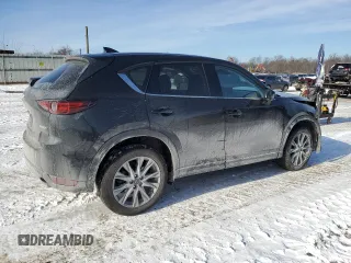 2021 Mazda CX-5 Grand Touring with VIN JM3KFBDM5M1456650, listed as a Copart auction lot 42124045 with 45,205 mi miles and Salvage Title. Bid and sale history available at carsss.com. Image 3.