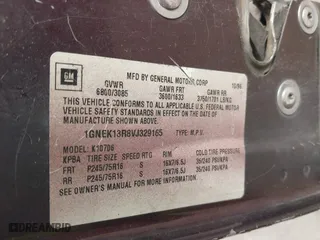 1997 Chevrolet Tahoe with VIN 1GNEK13R8VJ329165, listed as a IAAI auction lot 41631672 with 166,976 mi miles. Bid and sale history available at carsss.com. Image 9.