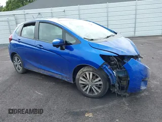 2015 Honda Fit EX-L z VIN 3HGGK5H85FM756706, wystawiony jako IAAI lot #42220287 z przebiegiem Nie podano mil oraz . Historia ofert i sprzedaży dostępna na DreamBid. Obrazek 1.