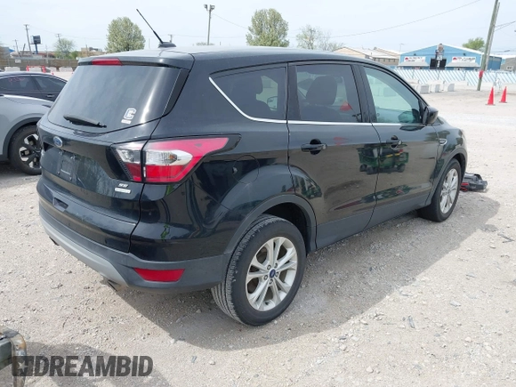 2017 Ford Escape SE with VIN 1FMCU0GD3HUC91104, listed as a IAAI auction lot 42142522 with 107,147 mi miles. Bid and sale history available at carsss.com. Image 4.