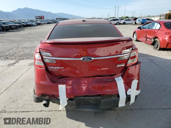 2014 Ford Taurus SHO with VIN 1FAHP2KT9EG115170, listed as a Copart auction lot 61203645 with 106,740 mi miles and Salvage title. Bid and sale history available at DreamBid. Image 6.